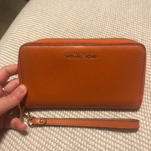 Orange Michael Kors Jet Set Wristlet
